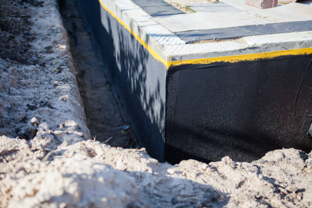 Professional Waterproofing technician working in Arlington, TN